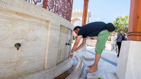 A Muslim preparing for salah