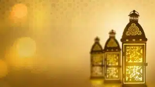 Three ornate lanterns in focus against a warm, golden background, with intricate patterns.