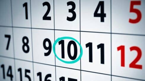 Calendar with numbers in a grid with a blue circle around the number 10.