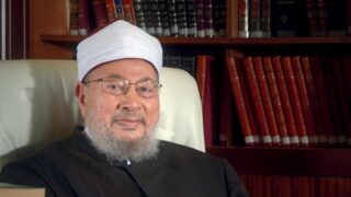 Yusuf Al-Qaradawi looking to camera