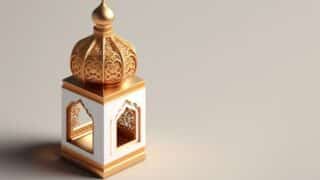 Decorative incaporatory in gold and white colors with geometric details and engravings in the upper dome.