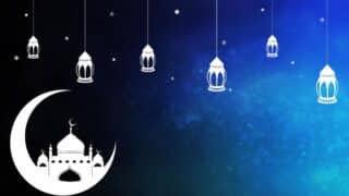 Crescent moon with mosque silhouette, stars, and hanging lanterns on a blue night sky backdrop.