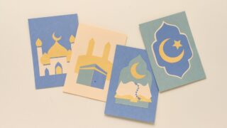 Four greeting cards with Islamic motifs, including mosques, crescent moons, and stars.